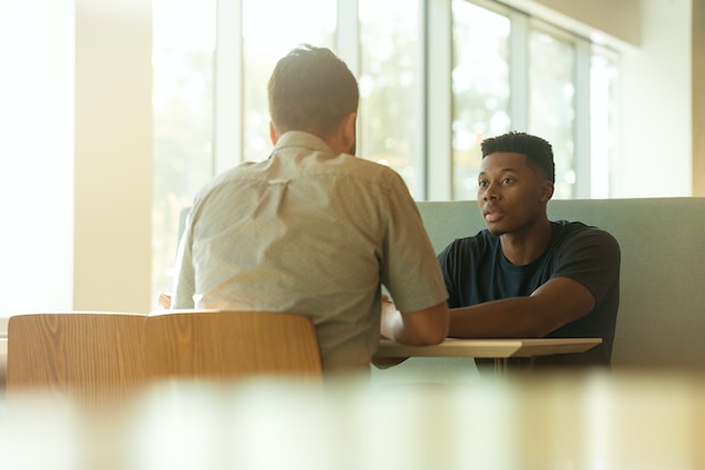 two men having meeting