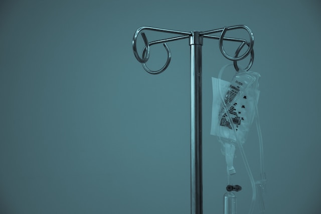 IV drip of person with medical debt