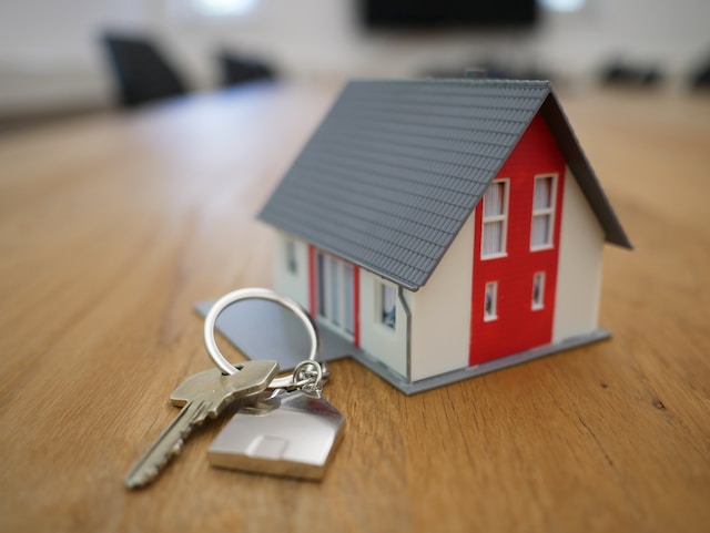 house keys near miniature house