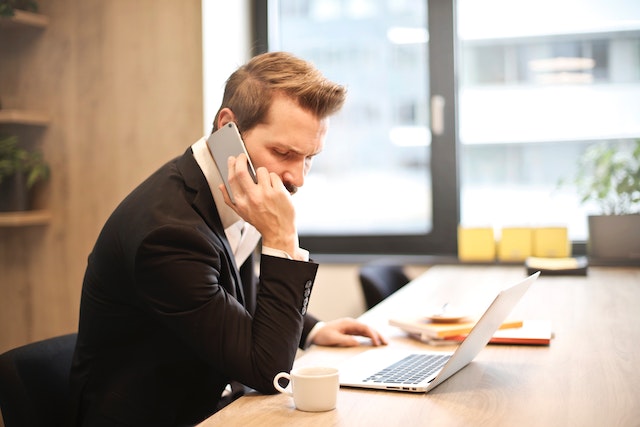 stressed man on phone