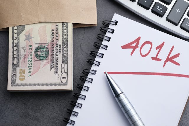paper with 401k underlined next to money